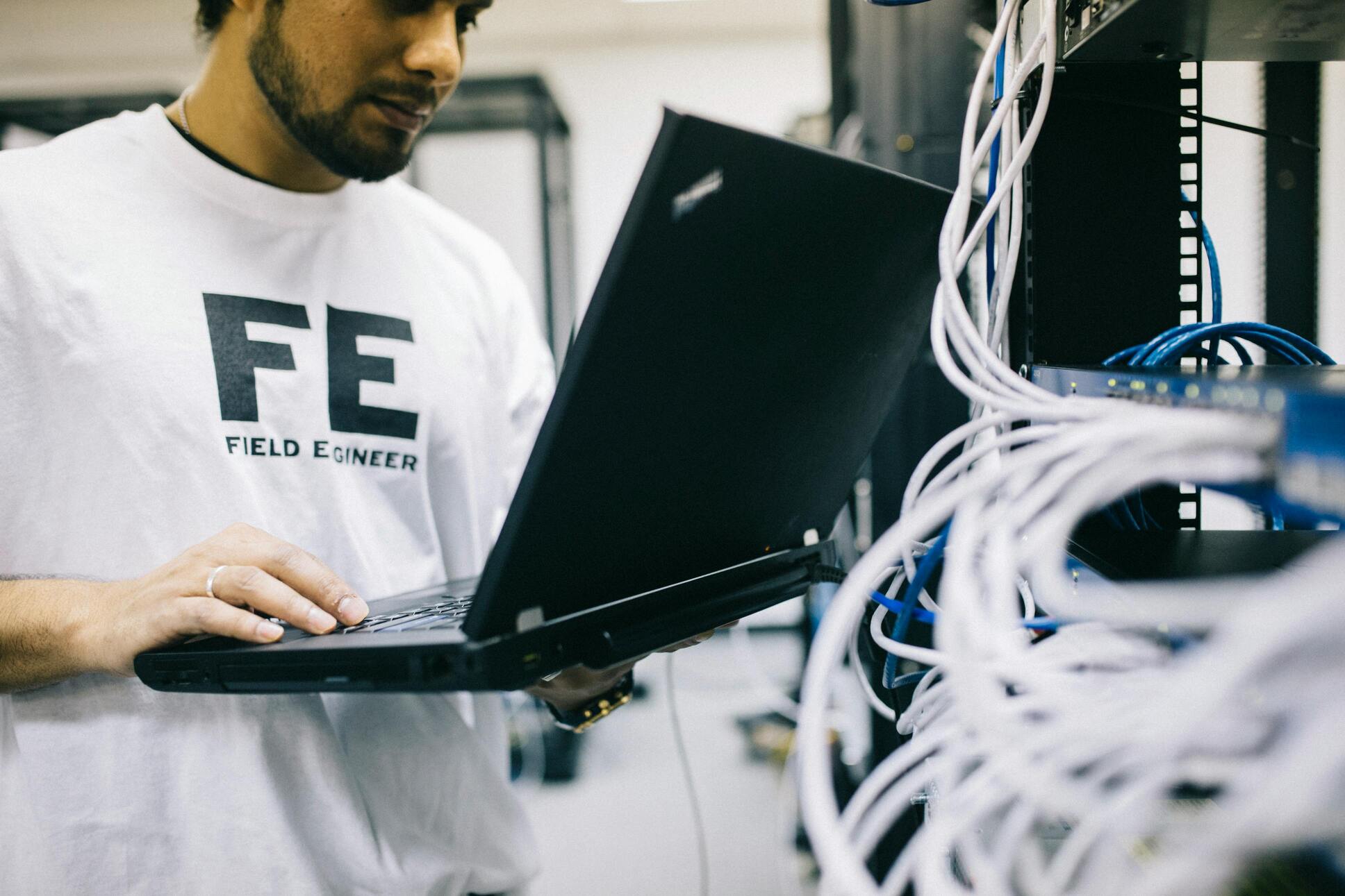 Fieldsify field engineer configuring network hardware on site